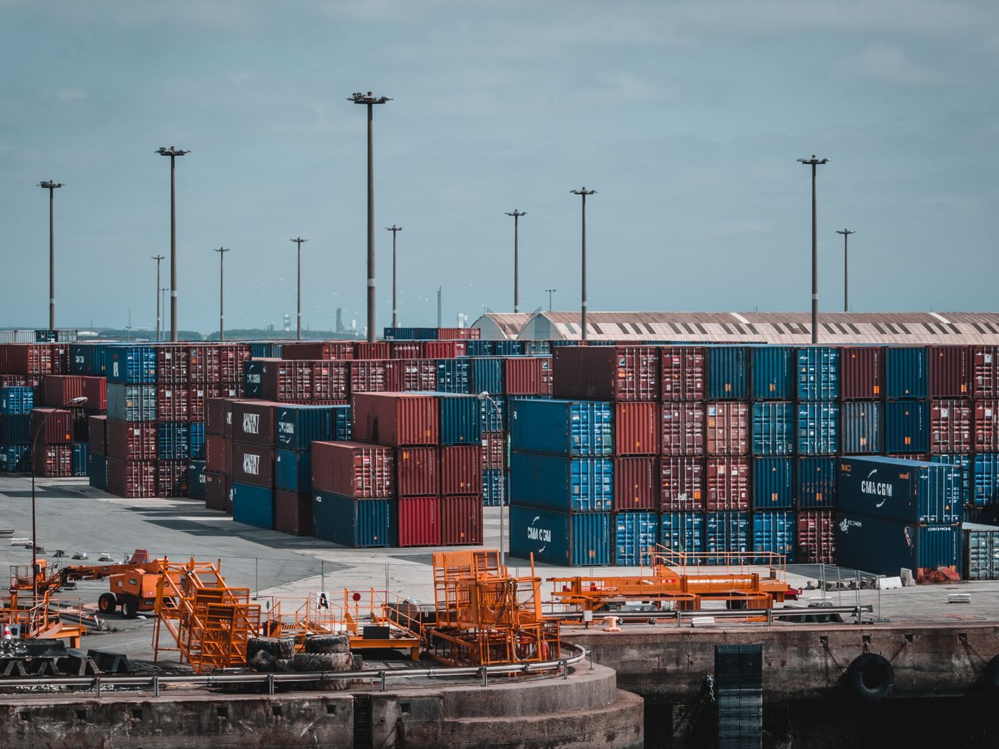 Shipping containers stacked in a freight yard